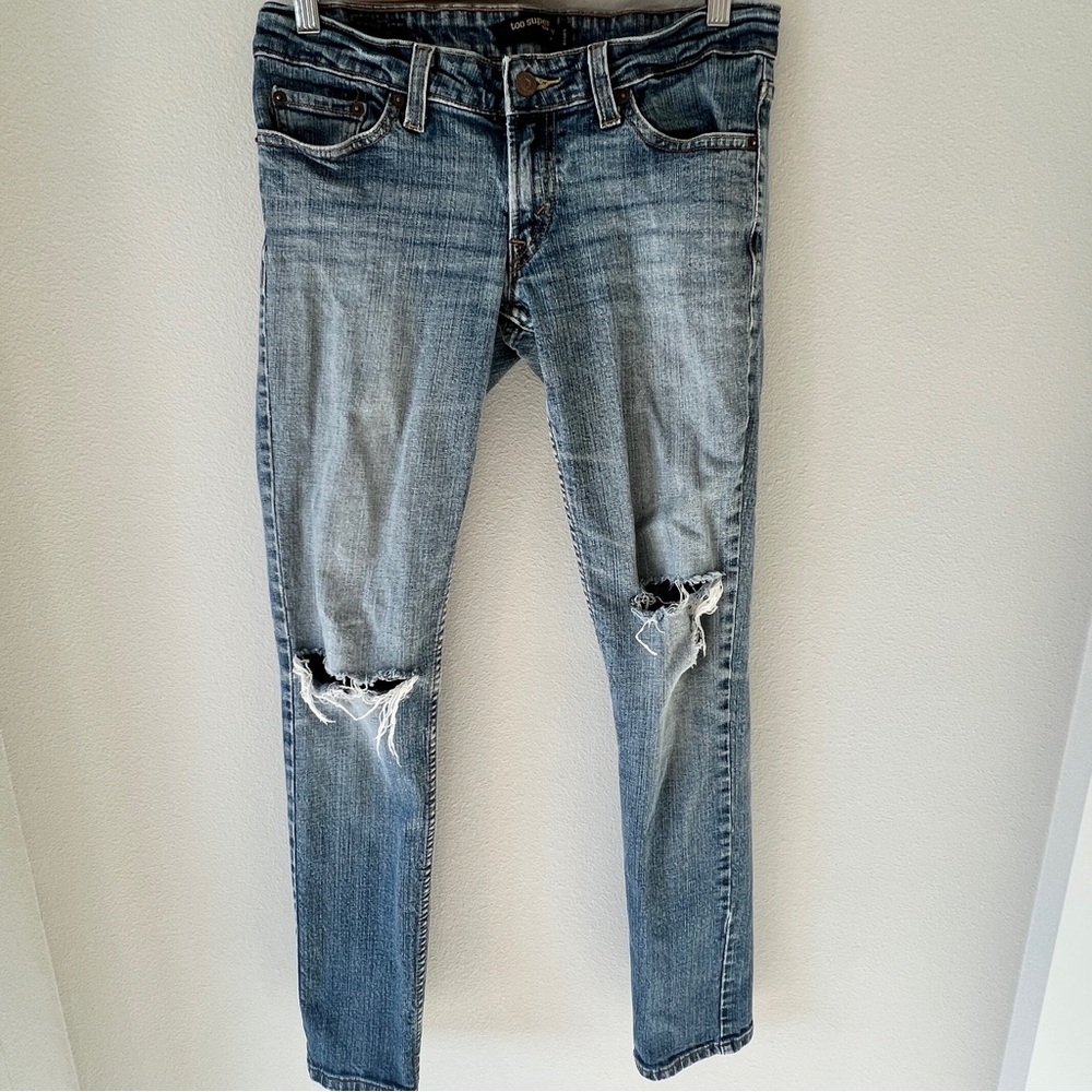 Levi's 524 Too Superlow Skinny women’s blue jeans size 7M Med stretch distressed